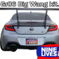 A grey Toyota GR86 with a large rear wing, viewed from the back. The license plate reads "POORSH." Text at the top reads "GR86 / BRZ Wang Kit '22+," featuring performance airfoils. The bottom right corner displays the 9livesracing logo.