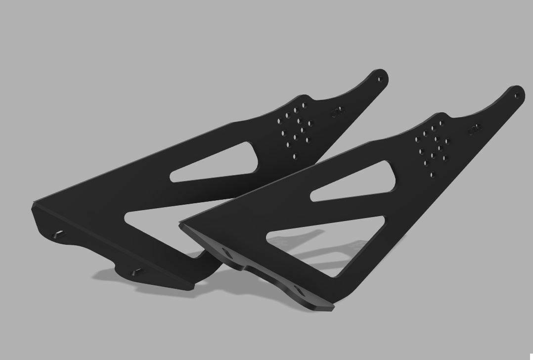 Two black, triangular brackets with slots and multiple perforations lie on a gray background. Each bracket has a series of holes along one edge, likely for mounting purposes. The brackets are positioned side by side, enhancing the lift-to-drag ratio crucial for 9livesracing’s Civic Type-R Wang kit 2017+ FK8 setups.